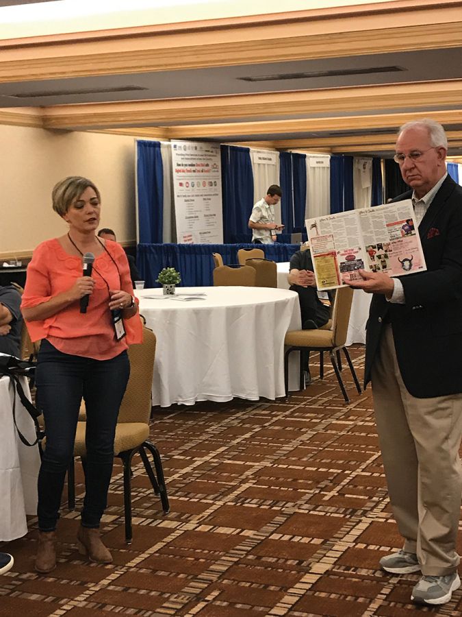 Jessica Prevatt, advertising director, The Baker County Press, Macclenny, Florida, shared details of the Press’ Christmas magazine with a special ‘shop local’ map, while moderator Robert M. Williams Jr. shows a copy.  The most popular session at convention, the Great Idea Exchange, was sponsored by Google News Initiative.
