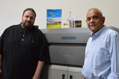 Image includes left to right: Mike Hughes, production manager, CEC Print Solutions and Amit Chokshi, owner, CEC Print Solutions, with the Versafire EP