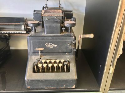 A vintage Dalton adding machine is one piece in Barbara Beck’s growing collection of artifacts from the Roswell Daily Record’s early years.