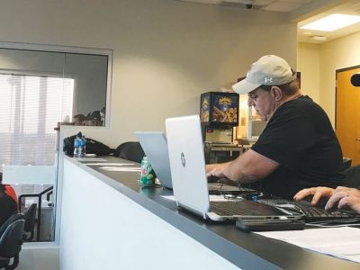 Tony Eierdam is shown in the Bearcat Stadium press box before a game early in the 2019 season.