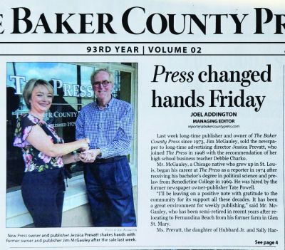 Jim McGauley turns over Baker County Press to Jessica Prevatt.
