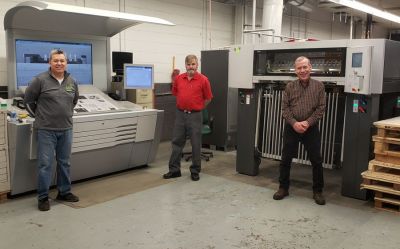 Image includes from left to right Jose Lopez, Rick Johnson and Gary Smith – all employees of Master Print