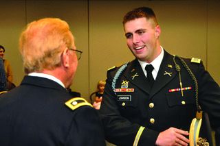 1LT David Johnson, right, visiting with Col. Chaplain, U.S.  Army (Ret.) Scott McCrystal after a Veterans Days service at Evangel University in November 2011.