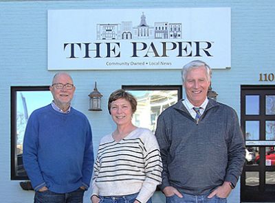 The Paper Editor Emeritus Bill Poteat, Executive Editor Angela Copeland and Owner/Publisher Allen Van Noppen stand outside the office.