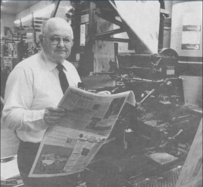 The Observer Publisher Bob Moody holds a copy of the paper in this undated photo. Moody, who served as publisher of The Observer 1974-1997, died Dec. 28, 2022, at Grande Ronde Hospital at the age of 90. (The Observer file)