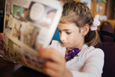 Newspaper in Education, or NIE, is an international program that promotes literacy by using the newspaper as a teaching tool.