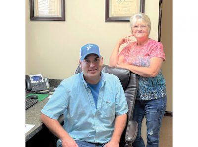 Chad Hobbs and Rena Singleton in their Brandenburg, Kentucky, office (courtesy of the Meade County Messenger)