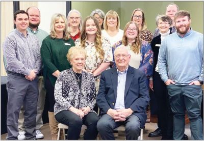Roy and Jeannine (seated in front) with  Wise County Messenger staff members (L-R) Brendan Marchand, Micah McCartney, Kristi Bennett, Donna Bean, Amy Neal, Laura Belcher, Lori White, Hannah King, Jenifer Kozlowski, Sandy Crump, Brian Knox and Austin Jackson.